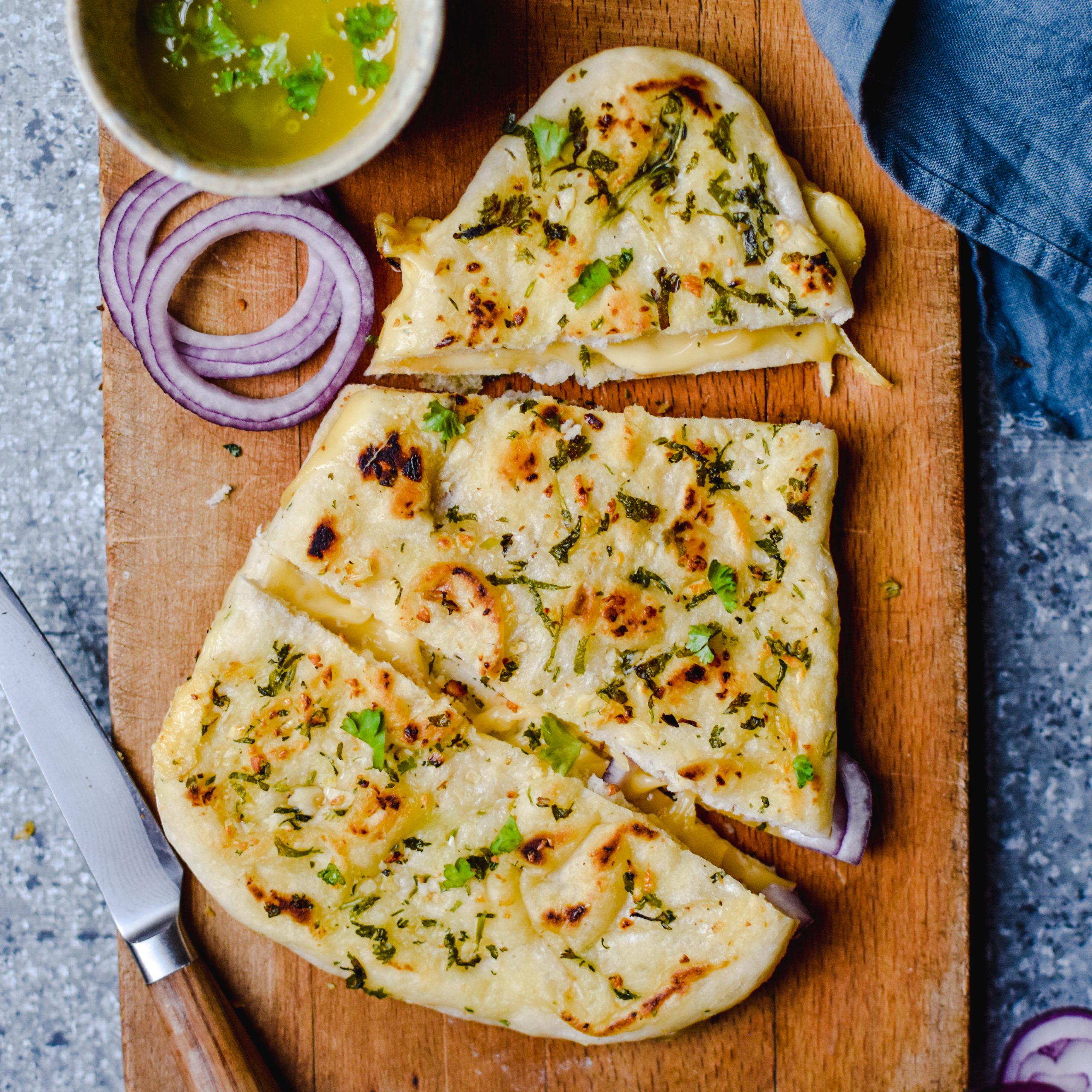 CHEESE NAAN (NAAN STUFFED WITH TWO KINDS OF CHEESE )